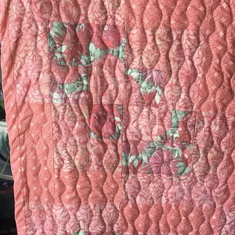 NWT. Hand Crafted Quilt in Corals